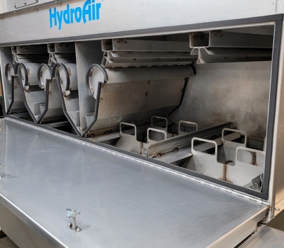8,000 cfm HydroAIR® with open access door show 5 Centrifugal Mist Eliminators over a full set of Scrub Modules below and set in place
